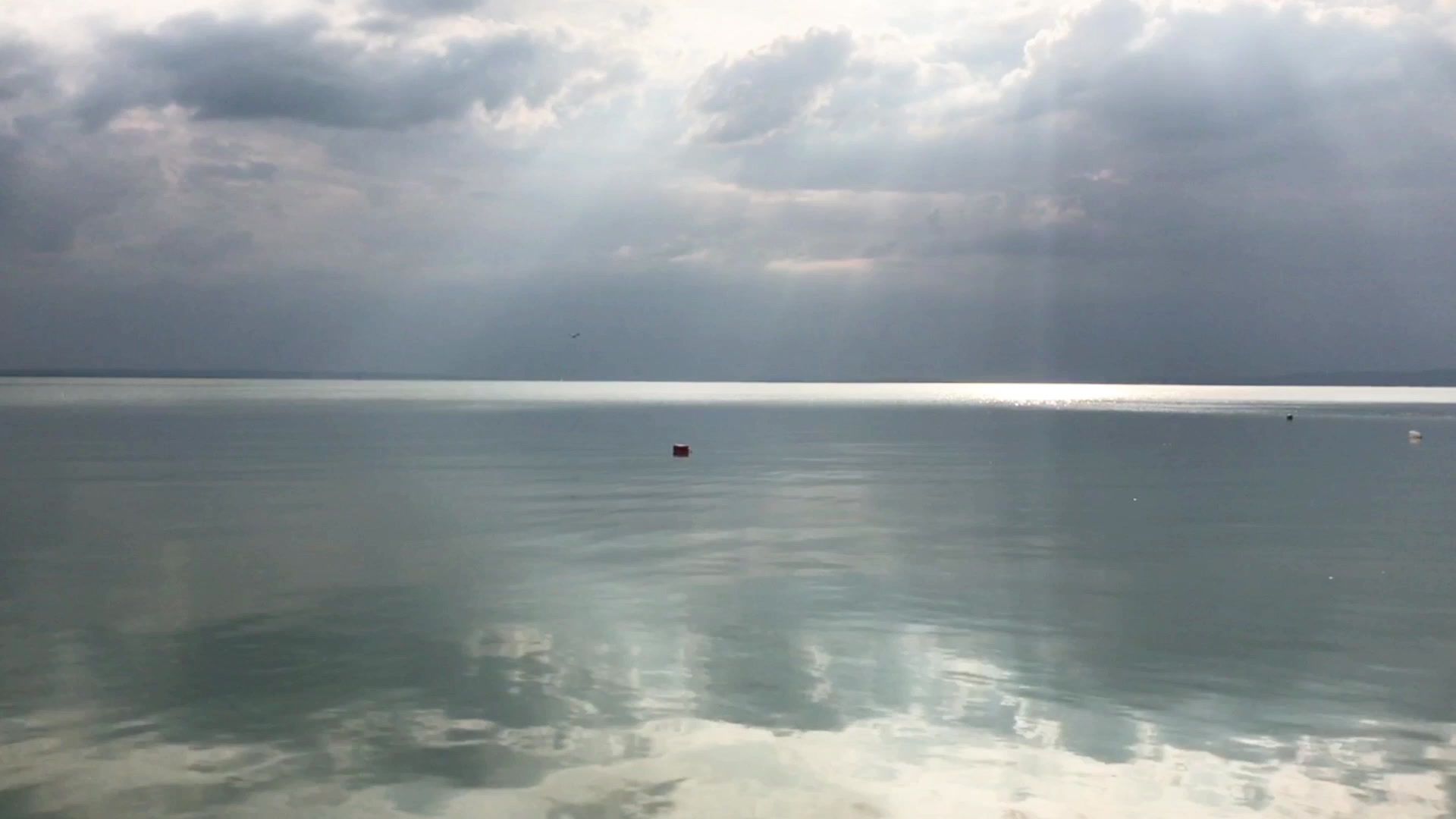 Calm sea under low mist